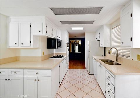 Photo of 5200 Irvine Blvd #254, Irvine, CA 92620 (MLS # OC25239161)