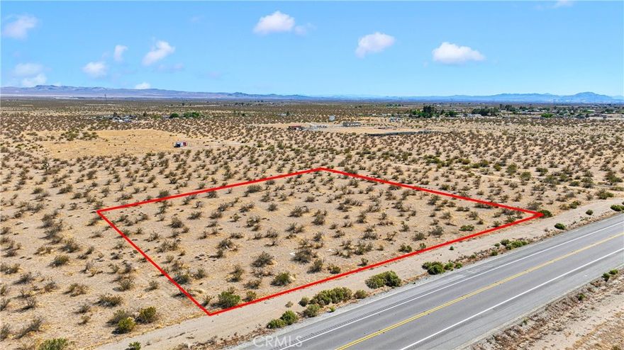Discover the perfect opportunity to build your dream home on this spacious 1.94-acre lot! This serene desert landscape offers breathtaking mountain views and a peaceful setting, ideal for those seeking a quiet retreat or a custom-built residence. Enjoy the freedom to design your home while taking advantage of the area’s stunning scenery and tranquil surroundings. The property is zoned for residential use, with underground utilities available and city water at the lot line (septic system required). With easy access to utilities and a prime location along CA-18 hwy, this property is a smart investment for future development. This lot provides endless possibilities. Act fast—this desert gem won’t last long!