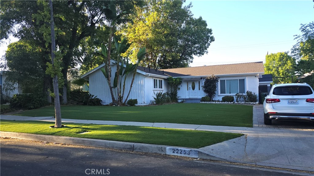 New Lease Listing! Located in the prestigious Woodland Hills Community of Los Angeles!BRAND NEW TURF FRONT AND BACK YARD!! 3 bedrooms plus 2 baths of designer ambiance. Magnificent large living space and over 7500 Square Foot lot! Remodeled this Contemporary and modern spectacular home with Kitchen, bathrooms, flooring, lighting, and newer fresh paint throughout, and walls of windows that bring in beautiful natural lighting! Designer electric fireplace, Hardwood looking flooring throughout, Recessed lighting and smooth ceilings through out! Gourmet chef's kitchen with quartz stone countertops plus fully loaded Stainless Steel Appliances including refrigerator. Entertain in the lovely dining/ living open floor plan that is light and bright!. Master bedroom is a true suite leads to private remodeled bath room! ! HUGE back yard the walk out with fruit trees and designer hardscaping that add to your tranquility! More features are : Central air conditioning system, dual pane windows , RV access to back yard, large covered patio for your all entertaining!! Two car garage with fully touch finishing, recessed lighting, epoxy flooring with fully loaded washer and dryer laundry machine included. Property is close to all! Easy access to Ventura , WARNER CENTER, TOPANGA VILLAGE and luxury shopping plus dining!