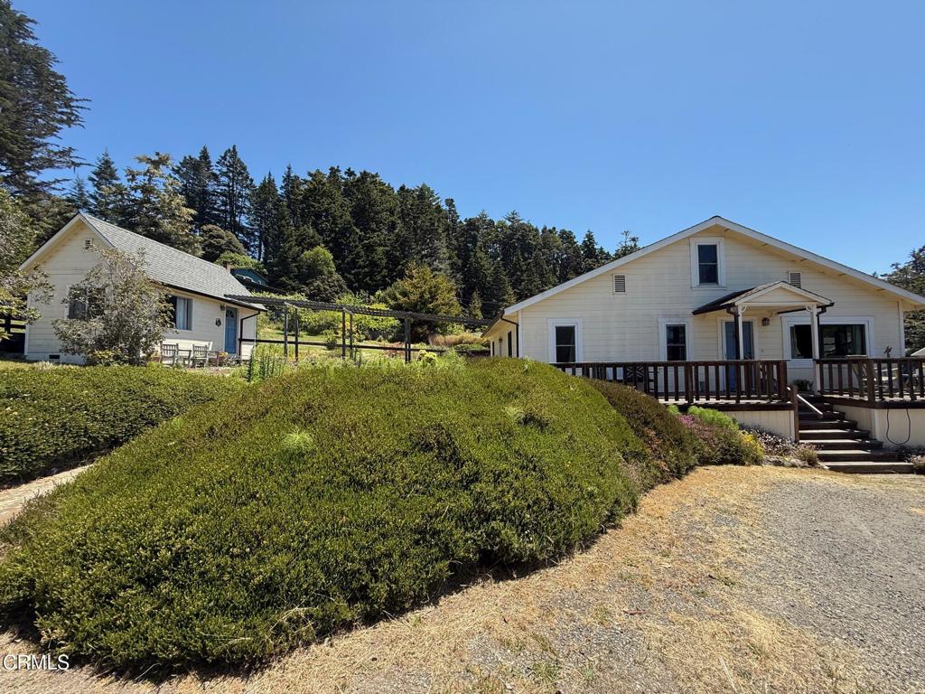 Ocean view beach home in Mendocino village on rare 1 acre parcel. The original 1912 main home has been remodeled from foundation to roof in 1992, featuring an inviting living room and spacious kitchen, views of the ocean or gardens from every window, central heat and hi-speed cable internet. The modern finished attic has a bedroom, half bathroom and more living space for a home office or art studio. Detached cottage good for family, guests or income. Additional office/art studio in the garden area with a walkway. Watch the hummingbirds and songbirds, the landscaped acreage has many fruit and olive trees, a large maple tree, redwood trees, flowers, and an irrigation system around the house. In addition, large fenced in meadow that is over an acre perfect for family and pets, and smaller fenced in yard in the front with a lawn. High speed internet is in. Good water system, 6000 gallons of water storage. Generac generator wired in in the event of an outage. Detached two car garage built in 2003 has room for cars, two storage rooms, and laundry facilities. City sewer. Located in Mendocino School district. Live the Mendocino dream steps or a bike ride to the beach, headlands, and the historic village.