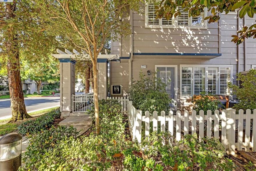 Charming, well-maintained end-unit home in a quiet, lovely, gated community. The open floor plan flows with living and dining areas ideal for both quiet nights and lively gatherings. The bright, remodeled kitchen features elegant Cambria quartz countertops, subway tile backsplash, upgraded cabinetry, and sleek stainless-steel appliances. Upgrades continue with a new HVAC system and stylish plantation shutters throughout. Upstairs, the layout includes a bedroom that can serve as a home office/den, a second well-sized bedroom, and a full bathroom. The generous primary ensuite bedroom features dual sinks, ceiling fan, and a mirrored closet. Enjoy outdoor living with two oversized patios, perfect for alfresco dining or a cup of coffee. The property has a convenient two-car garage. The refrigerator, washer, and dryer are included. This professionally managed community provides excellent amenities, including a community pool & spa, playground, and security gate. HOA dues cover essential services such as water, sewer, garbage, and exterior maintenance.  Commuting and errands are a breeze with easy access to freeways, shopping, downtown Tracy, and the ACE train, making this home a perfect blend of comfort, style, and convenience. Welcome home!