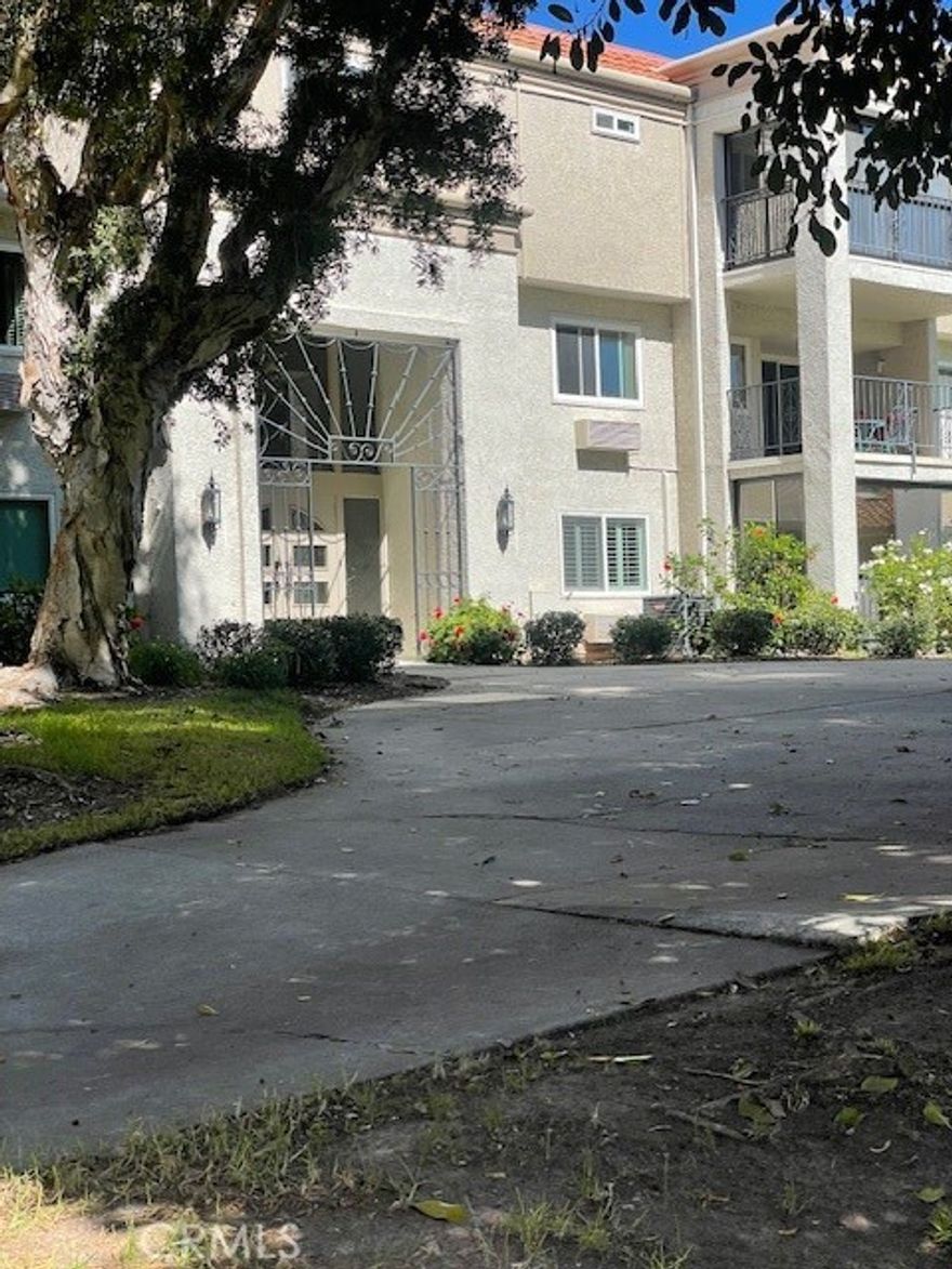Desirable El Mirador unit with exceptional views of the green way, golf course and trees!.  Very spacious unit and popular floor plan.  This unit has been updated a while ago  with 2 bedrooms and 2 bathrooms.  Unit is located on the first floor of this elevator building with subterranean parking.  You enter through privacy gates to a formal entry.  The Dining Room and Living Room are open concept that expands into the enclosed patio room.  Enjoy the easy care laminate flooring in the living room, dining room, tile in kitchen and bathroom areas. Kitchen has beautiful cabinets, stainless steel appliances, tile floor, recessed lighting and lots of cabinet space. Master bedroom has lots of closet space and newer flooring.  Nice vanity and tub- shower.  The Guest Bedroom is on the other side of the home offering lots of privacy for guests , separate bathroom with newer vanity and shower.  Other features include scraped ceilings, dual pane windows, forced AC/Heating.  Laguna Woods offers lots of amenities for your use and enjoyment.  Private Golf Course,  pickleball courts, tennis courts, clubhouses, bus transportation, swimming pools, lawn bowling greens, craft and hobby workshops, card room, billiard rooms, gym, horse stables and library, and Performing Arts Center.  Come relax and enjoy!