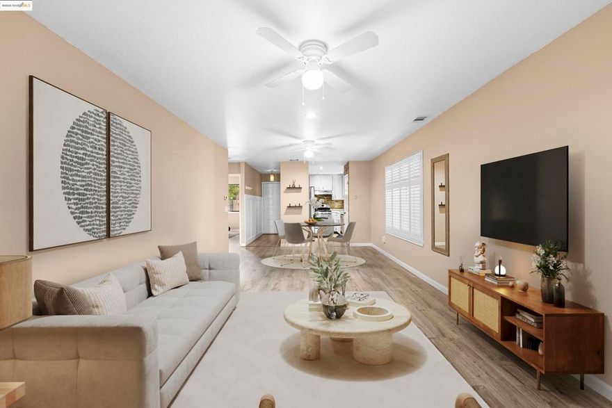 Discover this private one-story end unit, tucked away at the back of a beautifully maintained complex. Filled with natural light, the home features an inviting open layout, a tiled fireplace, and a convenient in-unit laundry room. Step outside to a peaceful patio with a serene tree-lined backdrop or enjoy a dip in the community pool. The unit comes with a parking spot and detached garage. Enjoy the best of both worlds—easy access to Hwy 12 while still enjoying quiet, private living. Property virtually staged.