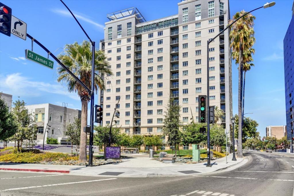 Welcome to City Heights, one of Downtown San Jose's premier highrise communities. This stylish 2-bedroom, 2-bath condo offers 955 sq. ft. of urban living with beautiful views of Pellier Park, the brand-new green space outside your windows. Freshly painted interiors feature dark wood laminate, tile, and carpet flooring. High ceilings and an open-concept living/kitchen area are perfect for relaxing or entertaining, while floor-to-ceiling windows fill the home with light and frame park and city views. Enjoy central A/C, energy-efficient double-pane windows, and in-unit laundry. The kitchen offers sleek cabinetry, granite countertops, stainless steel appliances, and a functional layout. Both bedrooms are well-proportioned, and two full baths provide comfort and privacy, including a primary suite with a spacious walk-in shower. City Heights offers secure entry, on-site property manager, fitness center, spacious lobby, mailroom, business center, and free 1 Gigabit internet. Steps from San Pedro Square, Little Italy, and more. Easy access to public transit, SAP Center, Diridon Station, and major freeways. Enjoy a downtown lifestyle with weekend farmers markets, First Fridays, boutique shopping, live performances, outdoor events, and easy access to transit, dining, nightlife & more.