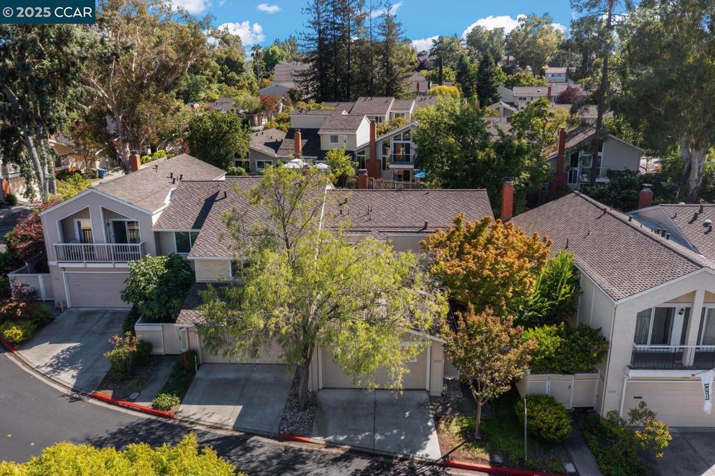 Charming townhouse in vibrant Heather Farms community of Walnut Creek! This lovely home has almost 1,700 square feet of pristine living space just waiting for you to move in and make it your own. The large eat-in Kitchen has been tastefully remodeled with lots of great cabinet space, stone counters and stainless steel appliances and is open to a cozy breakfast nook and Family Room for informal gatherings. The Living Room and Dining Area are light and bright with recessed lighting and windows and sliders overlooking the spacious patio. A powder room and washer/dryer closet are located on the first floor for your convenience. Upstairs is the Primary Bedroom Suite, two guest bedrooms and Guest Bath. The Primary Bedroom has a large walk-in closet and vaulted ceilings and both bathrooms have been tastefully remodeled with tile surrounds on modern vanities. Andersen windows and sliders are throughout the property. The expansive back patio is perfect for outdoor entertaining and has access to the neighborhood trails. Great location near John Muir Medical Center, Heather Farm Park, Diablo Hills Golf Course and BART.