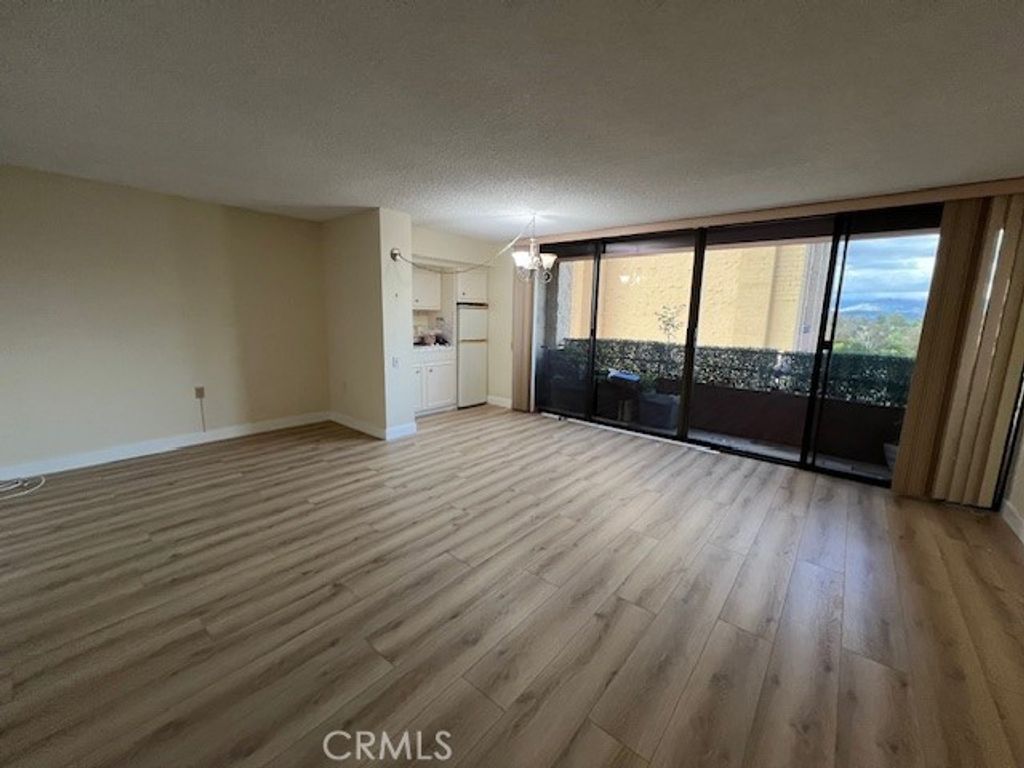 Photo of 24055 Paseo Del Lago #556, Laguna Woods, CA 92637 (MLS # PW26104948)