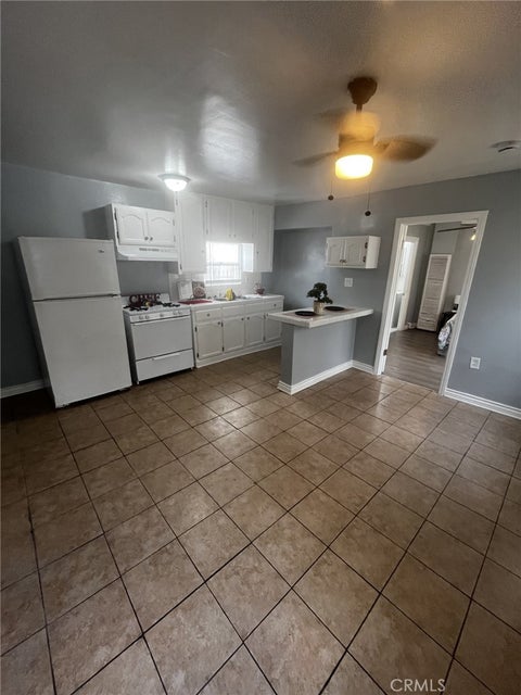 Photo of 4520 S Normandie, Los Angeles, CA 90037 (MLS # PW26112675)