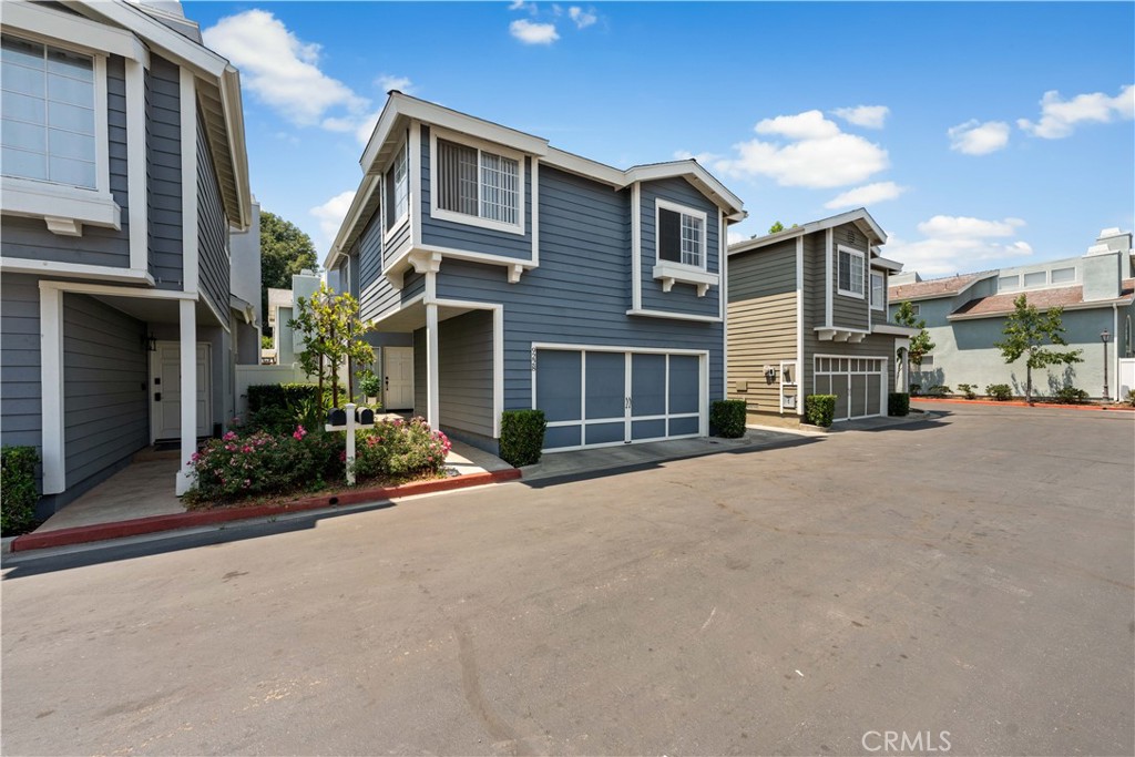 Experience this stunning 3-bedroom, 2.5-bath detached home in a gated North Hills community, boasting new flooring and fresh paint throughout. The sleek kitchen includes an eat-in area, perfect for casual dining.
Step into the dramatic living room with soaring ceilings and a cozy fireplace, plus a formal dining area, powder room, private backyard, and direct 2-car garage access.
Upstairs, indulge in the ultimate master suite retreat—featuring its own fireplace, a spacious sitting area, vaulted ceilings, a walk-in closet, a spa-like bath with walk-in shower, and a separate soaking tub. Two additional bedrooms and a full bath complete the upper level, all filled with natural light.
Extras include in-unit laundry and central HVAC. Move-in ready and truly one-of-a-kind!