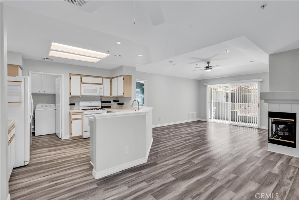 Welcome to this beautifully maintained 2-bedroom, 2-bathroom condo in the heart of Chino Hills, perfectly combining comfort, convenience, and lifestyle.
Step into a bright, open living area with a cozy fireplace and sliding doors leading to your private patio balcony with a large storage closet. The kitchen connects seamlessly to the dining and living spaces. On one side, the primary suite features cathedral ceilings, an ensuite bath with dual sinks, and a spacious closet, while the second bedroom is set on the opposite side — providing privacy and flexibility for guests, an office, or a personal retreat.
Enjoy the ease of in-unit laundry, your private one-car garage, a sparkling community pool, and a prime location near The Shoppes at Chino Hills, dining, parks, and top-rated schools — plus quick freeway access to Orange, Riverside, Los Angeles, and San Bernardino counties