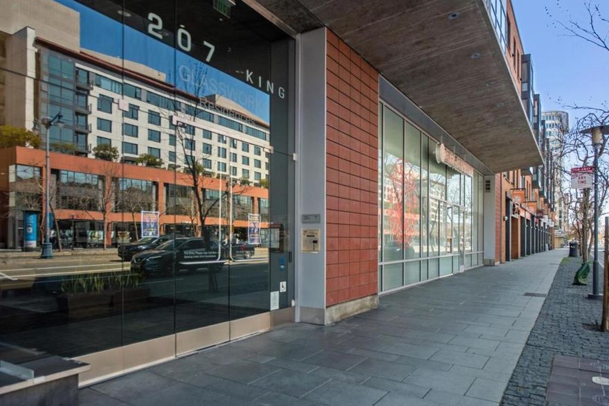 Not Just A Home A Lifestyle Statement. Step into soaring ceilings, walls of glass, and a stage set for San Francisco living at its most iconic. This rare two-level loft is a showpiece where floor-to-ceiling windows erase the boundaries between your space and the city skyline. Culinary Excellence Quartz countertops, a Viking gas range, sleek under-cabinet lighting, and a statement island designed for both function and flair. Inspired Living Spaces Open, airy, and endlessly adaptable with the city as your ever-changing backdrop. Private Retreats Two sun-drenched bedrooms with oversized windows and sky-high ceilings, plus a versatile loft space perfect for a home office, creative studio, or quiet escape Custom closet organizers, polished hardwood floors, and secure garage parking that make life effortless. And beyond your front door? Oracle Park across the street. Chase Center minutes away. World class dining, arts, culture, and nightlife at your fingertips.This isnt just a condo.This is your front row ticket to the best of San Francisco.