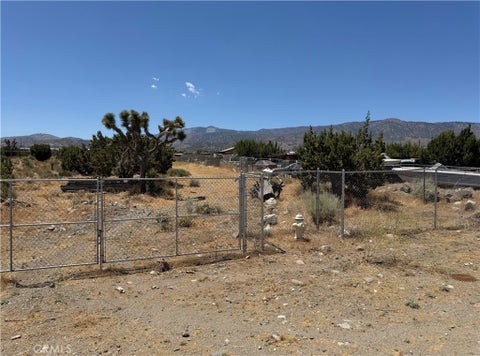 Photo of 2625 Cholla RD, Phelan, CA 92371 (MLS # IV26127554)