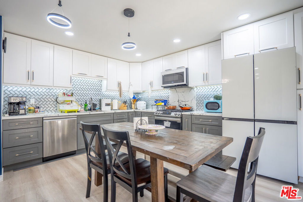 12203 Santa Gertrudes Avenue 64