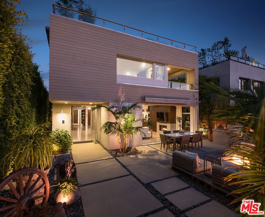 With over 5,000 square feet of living space and parking for up to 5 cars, you cannot miss this one! This custom built, exquisitely designed home offers privacy and serenity in one of the most sought after locations in Venice, just half a block off Abbot Kinney. The spacious, bright open floor plan offers 5+ beds, 6 baths, seamlessly combined indoor/outdoor space on all 3 levels, screening/media room & rec room connecting to a must-see rooftop deck. The main living level is an entertainer's paradise with Miele appliances, 2 walk-in pantries, 2 large center islands opening to a spacious dining/family room with large sliding glass doors and luxurious main patio. Equipped with built-in outdoor kitchen, extra large firepit, dining area and custom plunge pool with waterfall. Upstairs you will find all bedrooms, including a stunning master suite with a cozy see-through fireplace connecting you to your very own secluded private balcony. The his/hers custom closets will lead you to a dreamy spa-like bathroom. The upgrades are endless, this home is complete with fully automated Smart Home system, automatic black-out blinds, 12-person hot tub/plunge pool, and hook-ups for rooftop hot tub. Garage will hold 3 cars, along with room for 2 in driveway.