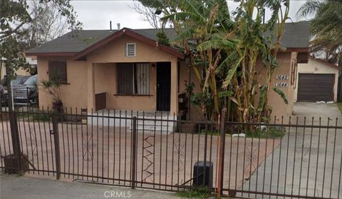 Photo of 1644 E 110th St, Los Angeles, CA 90059 (MLS # NP26000738)