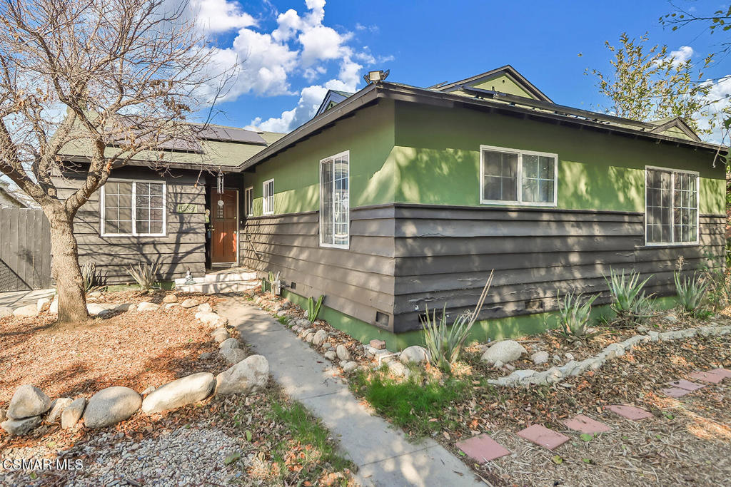 Welcome to this 4 bedroom, 2 bath, 1,700 sqft single story home nestled on sizable lot in the heart of the San Fernando Valley. This diamond in the rough is ready for you to make it a stunning gem. The main house includes 3 bedrooms plus an office/studio, 2 bathrooms and 2 cozy fireplaces! The windows are all dual pane, and there is a solar system in place to keep your bills low. Other recent upgrades include a new sewer line from the house to the street and an upgraded HVAC system. The backyard is completely gated for privacy, with direct access from the alley, and can be used for additional parking or potential additional units. Located just minutes from major freeways, local amenities, parks, shopping centers, and schools, this is a great opportunity to bring your imagination and tool box and make this your dream home or investment property.