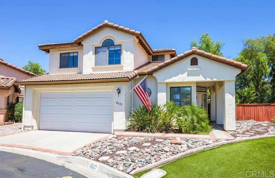 Perched at the end of a peaceful cul-de-sac in the hills of Santee, this beautifully updated 4 bedroom home offers breathtaking panoramic mountain and valley views - with more than 180° of unobstructed scenery. This home is a true retreat, offering unmatched privacy inside and out. You'll love the mature, low-maintenance landscaping, new fencing, entertaining area, and brand-new 2023 Astroturf for year-round beauty and convenience. Inside, discover a thoughtfully remodeled interior boasting vaulted ceilings, new flooring, baseboards, and fresh paint throughout. Renovated kitchen (2023) features new countertops, backsplash, deep sink, high-end faucet, garbage disposal, 2025 gas range, and a sleek LG touch-light fridge with exterior beverage door. There’s space for entertaining with separate living and family rooms, dining space, and a downstairs guest room. The primary suite is a sanctuary with sweeping views and a renovated ensuite bath including a modern vanity, glass-enclosed walk-in shower, Moen fixtures, and new toilet. The upstairs hall bath has also been updated with a new vanity, toilet, and Kohler fixtures. Additional highlights include: Newer AC and tankless water heater, upgraded lighting throughout, ceiling fans in every bedroom, excellent storage, great community with low turnover. The HOA amenities include a pool, Jacuzzi, cabana, basketball court, and green spaces—perfect for relaxing or socializing. Located just 5 minutes from highways 52, 125, and 67, and only 20 minutes to La Jolla, Pacific Beach, Ocean Beach, the airport, and downtown San Diego. With over $65,000 in recent upgrades since 2022, this home offers the perfect blend of modern comfort, community charm, and unbeatable location. Zoned for highly rated Santee and Grossmont school districts, and positioned to capture a daily cross breeze and holiday fireworks shows, this is the rare property that truly has it all!