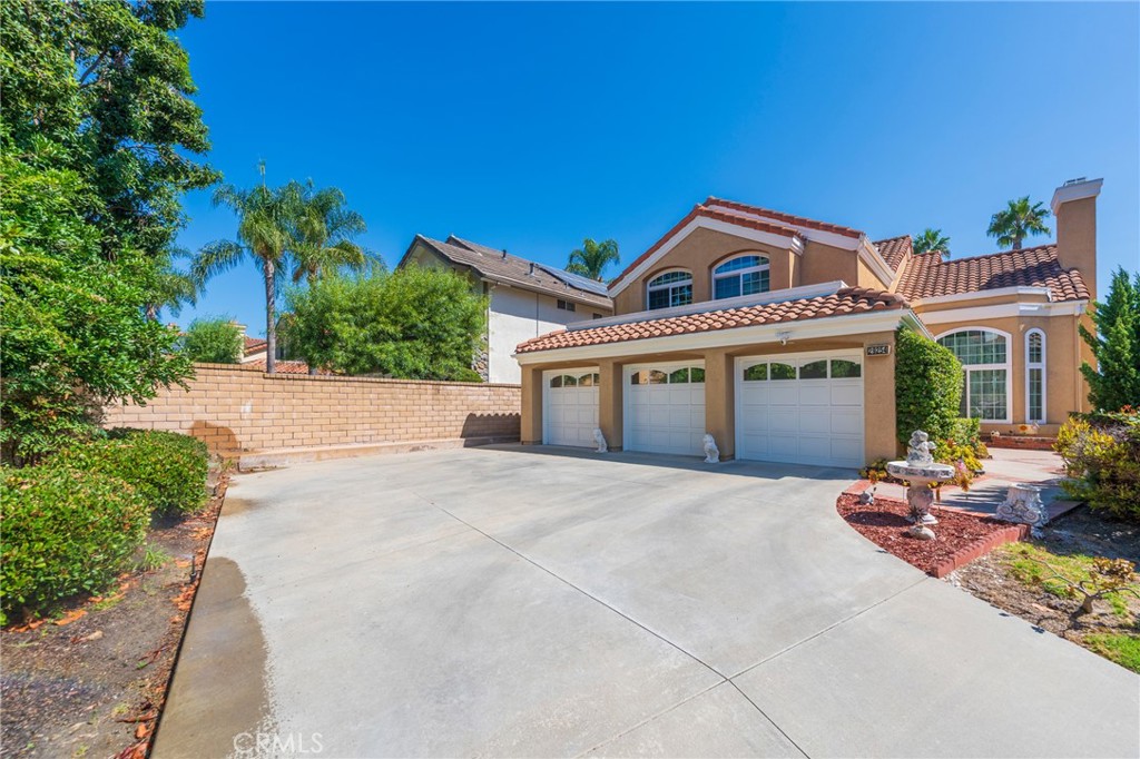 Welcome to 29254 Alfieri Street – A Private View-Filled Retreat in Laguna Crest Estates!
Tucked away on a quiet cul-de-sac, this exceptional 4-bedroom, 3-bathroom home offers the perfect blend of privacy, space, and panoramic views. The oversized 3-car garage and expansive driveway provide rare flexibility—ideal for RVs, boats, or hosting guests with ease. Step through elegant double doors into a light-filled interior where comfort meets sophistication. Downstairs features a full bedroom and bath, perfect for guests or multi-generational living. The formal living room, anchored by a cozy fireplace, flows into a dramatic dining area with direct access to the backyard oasis—where unobstructed vistas stretch endlessly. The chef’s kitchen is a true centerpiece, boasting generous counter space, a central island, and captivating views that make every meal preparation a pleasure. It opens seamlessly to the family room, complete with a second fireplace and sliding doors that invite indoor-outdoor living. Upstairs, the primary suite is a sanctuary of its own, featuring a spa-inspired ensuite with dual vanities, a jacuzzi tub, separate shower, walk-in closet, and a private balcony where you can sip morning coffee or unwind under the stars.
On the opposite end of the upper level, you'll find two additional spacious bedrooms and a large, shared bathroom—perfect for family, guests, or a home office setup. Each room is thoughtfully designed to maximize comfort and natural light, offering peaceful retreats with plenty of storage.
Outside, the backyard is a tranquil escape with lush landscaping, room to entertain, and the kind of views that make you pause and breathe it all in. Whether you're hosting sunset dinners, watching the city lights twinkle, or simply enjoying the quiet, this home offers a lifestyle that’s both elevated and effortless.