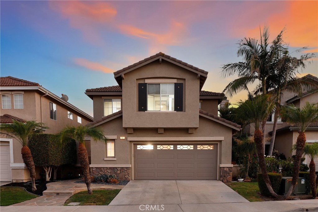 Wonderful single-family residence nestled on a cul-de-sac within the idyllic, gated Harvard Square neighborhood of Irvine. This must-see home has been highly upgraded throughout and boasts a spacious, inviting layout. The remodeled kitchen is a chef’s delight, featuring fresh white custom cabinetry extended to the ceiling, elegant countertops, stainless steel appliances—including a wine refrigerator—and an apron-front sink. The main level includes a bedroom currently used as an office and a full bathroom, perfect for guests or as a flexible living space. Upstairs, discover a tranquil owner’s suite complete with an oversized dual shower, dual vanities, and custom built-in closets. Three additional secondary bedrooms offer versatility, along with a separate laundry room. Outside, escape to your private oasis in a fully landscaped, low-maintenance yard. Entertain and dine al fresco with a built-in BBQ and a pergola-covered patio. Additional upgrades include, but are not limited to, custom window coverings, ceiling fans, smart locks, owned solar, newly installed heating and cooling system, and a fully finished garage with epoxy flooring, custom cabinetry, and a tankless water heater. Enjoy comfort and convenience in this secure, gated community with a serene park, pool, sports courts, and playgrounds. Located in the top-rated Irvine school district, the home is minutes from Trader Joe’s, The Irvine & Tustin Marketplaces, The District, and major freeways. This turnkey residence with low HOA fees and no Mello-Roos offers a rare opportunity in a prime location!
