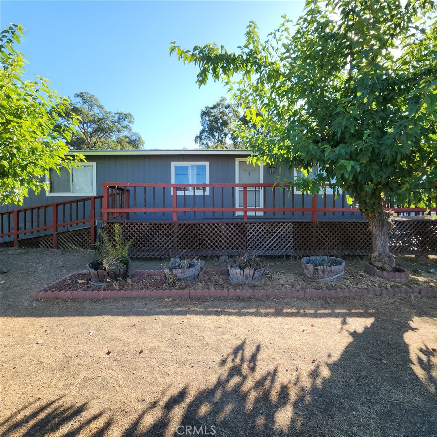 Welcome to this well-maintained 2-bedroom, 2-bath home situated on a spacious corner lot, offering comfortable living with an open-concept kitchen, spacious living room with lots of natural light. Enjoy your morning coffee on the inviting front porch. Additional features include plenty of parking, a  covered carport, RV parking with hookups, close to the lake and boat launch.  Lucerne is a peaceful lakeside community on the stunning north shore of Clear Lake- ranked#1 in the Western U.S. for its bass fishing. Whether you're looking for a full-time residence, investment opportunity, this home is for you.