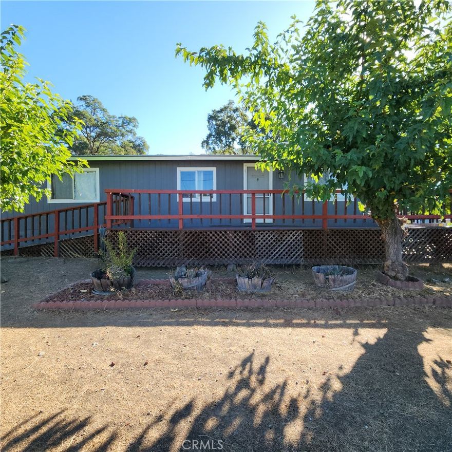 Welcome to this well-maintained 2-bedroom, 2-bath home situated on a spacious corner lot, offering comfortable living with an open-concept kitchen, spacious living room with lots of natural light. Enjoy your morning coffee on the inviting front porch. Additional features include plenty of parking, a  covered carport, RV parking with hookups, close to the lake and boat launch.  Lucerne is a peaceful lakeside community on the stunning north shore of Clear Lake- ranked#1 in the Western U.S. for its bass fishing. Whether you're looking for a full-time residence, investment opportunity, this home is for you.