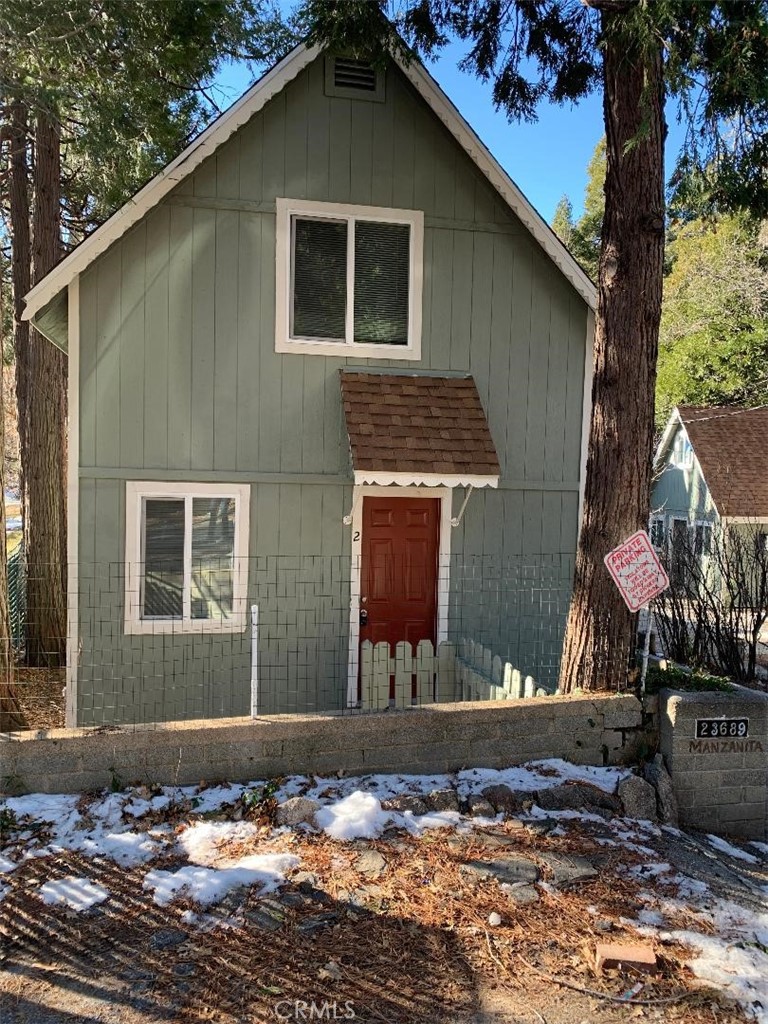 Super cute mountain cabin, with 2 bedrooms (upstairs) and 1 bath. Kitchen includes gray shaker cabinets with a stainless-steel sink, gas range and refrigerator. Laminate flooring downstairs, carpet upstairs and window coverings throughout. Rent includes water, sewer and trash services.