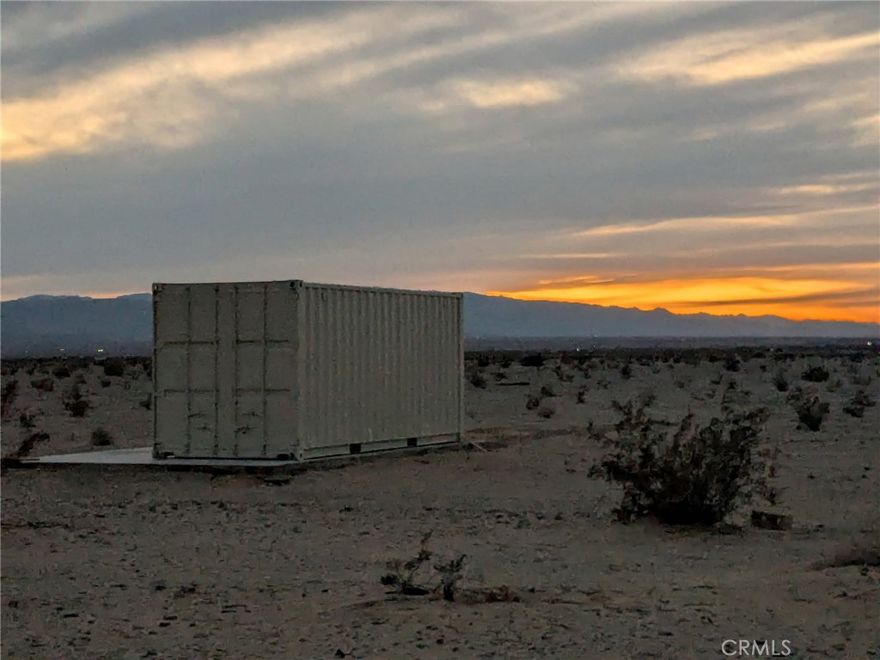 In an almost perfect location in Wonder Valley sits a pristine concrete slab. On that slab sits a shipping container. One acre is fully enclosed with new fencing and access gates. With privacy, sincerity and some of the best views in Wonder Valley, this 5 acres won't disappoint anyone. Come get it before someone else does. The Stars Are Worth the Price of Admission.