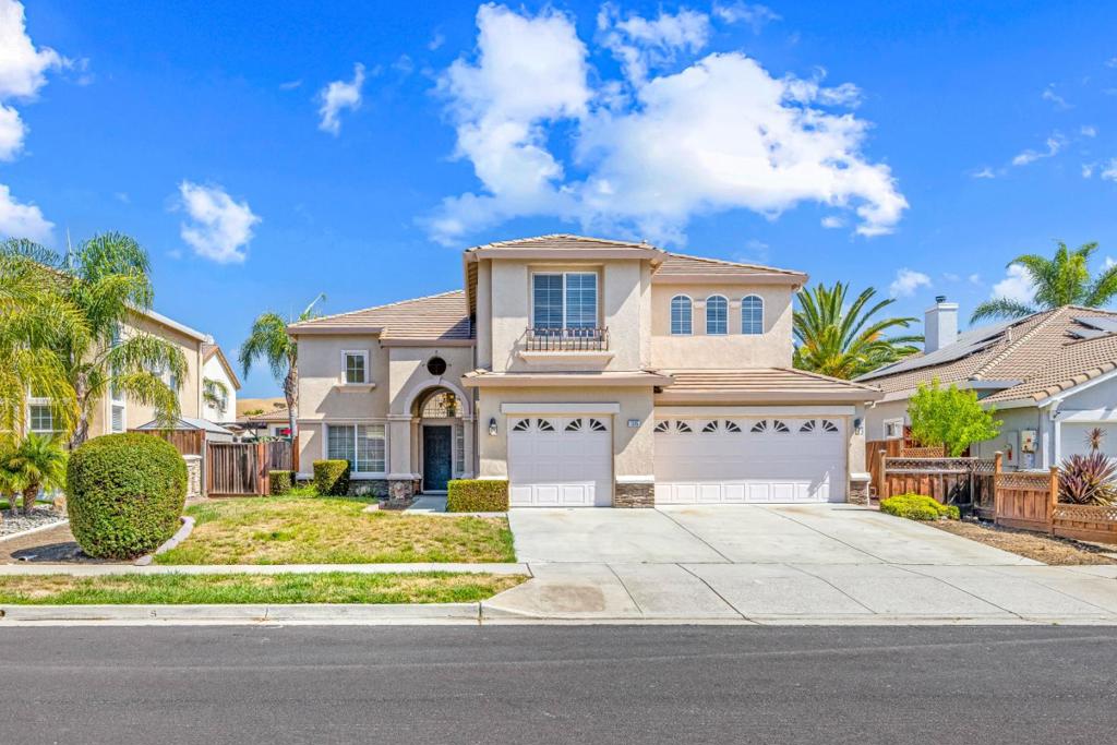 Discover this stunning home located in the sought-after Northwest side of Gilroy, nestled within the desirable Westside Hills community. This property is ideally situated within walking distance to Christopher High School, Sunrise Park, and picturesque walking trails. While county records indicate 5 bedrooms, the original owner opted for a versatile 4-bedroom layout featuring the open loft's in lieu of the 5th bedroom. This loft area is currently open but can be easily converted into closed bedroom's if desired, providing flexibility to suit your needs. As you enter, you'll be greeted by soaring ceilings and an abundance of natural light that flows throughout the open floor plan, creating a welcoming atmosphere. The main level includes a loft/bonus room and a convenient half bathroom, ideal for guests or for creating a comfortable home office and gym space. The expansive backyard is perfect for entertaining, complete with a built-in BBQ kitchen for all your outdoor gatherings. Centrally located near Highway 101, the Gilroy Premium Outlets, Gilroy Gardens, Downtown and the famous South County Wine Trail, this home offers an exceptional blend of comfort, accessibility, and lifestyle. With top-rated schools in the vicinity, its an ideal setting for raising a family.