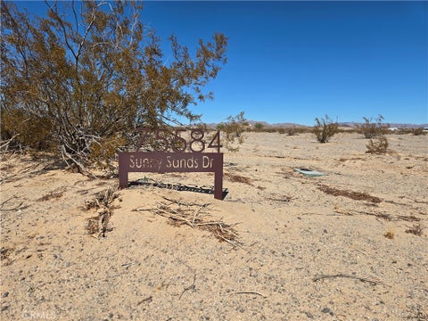 Photo of 75584 Sunny Sands Dr, 29 Palms, CA 92277 (MLS # JT26223787)
