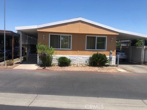 Photo of 16600 Downey Avenue #115, Paramount, CA 90723 (MLS # DW25154331)