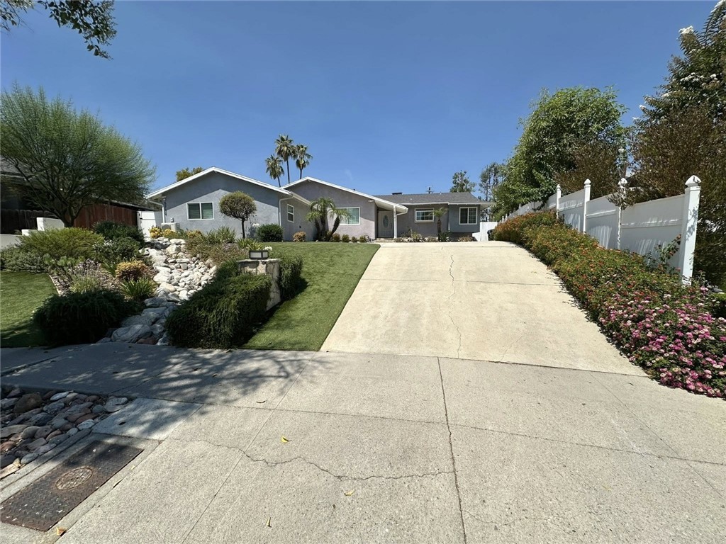 Welcome to your beautiful new home in the charming area of Wooden Hills, tucked away on a peaceful tree-lined street! This spacious and bright house boasts four cozy bedrooms and 2.5 baths, making it perfect for comfortable living. As you step inside, you’ll be greeted by a lovely kitchen featuring a quaint nook, with the laundry area conveniently located to your right. All the bedrooms are conveniently situated near each other, across from the inviting living and dining rooms. You'll also find a delightful patio enclosure where you can unwind and take in the lovely outdoor views. The outdoor area is perfect for relaxing, featuring a pool and a BBQ space, all while enjoying plenty of privacy and relaxing Mountain View. Plus, all appliances are included. Don't miss out—come take a look at this gem! It's conveniently close to shopping, restaurants, Topanga Mall, the 101 Freeway, and excellent schools. Love