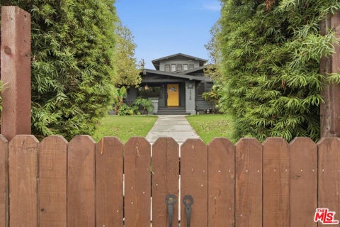 Photo of 1548 W 48th Street, Los Angeles, CA 90062 (MLS # 26985561)