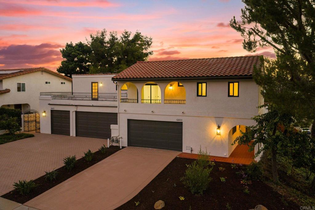 Welcome to 6801–6803 El Fuerte—a one-of-a-kind, fully renovated Spanish duplex in the heart of Carlsbad that checks every box and then some. With ocean views, spacious living, stylish design, and serious flexibility, this is not your average property. The larger residence (6803) boasts 3 oversized bedrooms and 3 full bathrooms across a generous 2,811 sq ft. Every bedroom is large enough to serve as a primary, and one is conveniently located on the entry level. The dramatic two-story entry sets the tone with soaring ceilings, natural light, and a grand staircase with classic Spanish banister detail. The show-stopping kitchen and family room are warmed by terra cotta color tile, wood ceiling beams, and elevated finishes throughout. Upstairs, a laundry room adds daily convenience, while ocean views from multiple rooms remind you just how special this location is. The second home (6801) offers 2 bedrooms, 2.5 bathrooms, and 1,441 sq ft of equally thoughtful design. Soaring vaulted ceilings with exposed beams and skylights create a bright, inviting vibe. Each bedroom has its own bathroom, as well as a powder room downstairs for guests. The laundry/mud room is straight out of a magazine—complete with counter space, sink, and custom details. Both units enjoy private yards—one with a DG patio, solo stove, and lounge seating for cozy evenings by the fire, and both with grassy areas perfect for pets or play. Parking is rarely this easy: 6803 features a 3-car garage, while 6801 has a 2-car garage, plus spacious driveways on both sides. This is a truly rare asset in Carlsbad—two stylish, move-in-ready homes with views, yards, garages, and endless versatility. Live in one and rent the other, keep family close while maintaining privacy, or rent both for an excellent investment return. An ideal candidate for a 1031 exchange, or simply the perfect turnkey opportunity for someone who wants something special without lifting a finger.