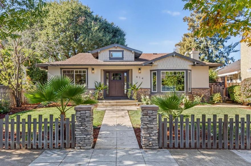 Located in one of Los Altos most idyllic tree-lined neighborhoods moments from downtown, this turn-key Craftsman combines designer style with ideal indoor/outdoor flow. A fenced front yard and covered entrance introduces the homes natural color palette and quality craftsmanship. Inside, gorgeous hardwood floors and abundant natural light highlight the great room design where the living, dining, and kitchen flow seamlessly together. The living room centers around a stacked-stone fireplace flanked by custom built-ins, while the dining room opens to the side patio. The chefs kitchen boasts two-toned granite and marble counters, full-height stone backsplashes, a large center island, and luxe appliances. Four bedrooms include a front-facing bedroom or ideal office, and a serene primary suite with two custom closets and an en suite with a steam shower and heated floors. The backyard oasis features a pergola-covered dining patio, fire pit, water feature, and lush lawn, perfect for entertaining or a quiet retreat. The oversized two-car garage can be used for recreation with a 12 door to the yard and a gate to a private lane at the back of the home. Luxurious California living, in premier Old Los Altos with fabulous shops and restaurants just a few steps away!
