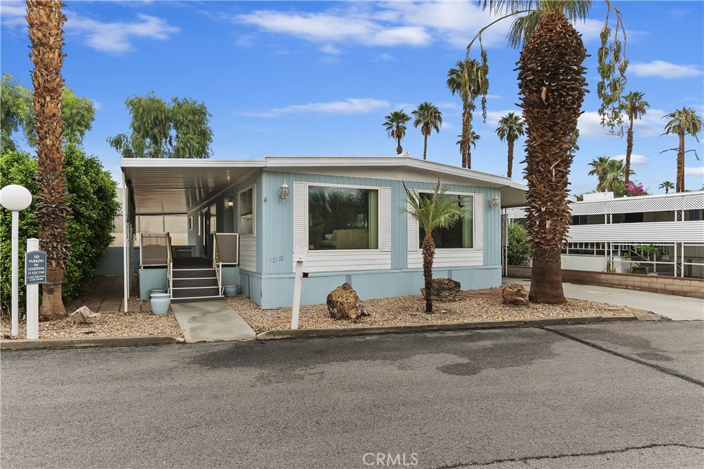Welcome to this charming 2-bedroom, 2-bath manufactured home in the age-qualified Royal Palms community, perfectly situated among swaying palm trees near Palm Springs and the San Jacinto Mountains. Offering 1,440 sq. ft. of comfortable living, this home comes fully furnished, making it move-in ready. Enjoy the convenience of a laundry room, a relaxing back patio, and a covered carport.
Royal Palms is a vibrant 55+ community with a strong sense of connection. Residents enjoy an array of amenities including a heated pool, spa, fitness center, and a welcoming clubhouse for social gatherings. The neighborhood is pet-friendly and gated for added security. Embrace an active and engaging lifestyle in this community where comfort, leisure, and social connection come together.
Royal Palms is a manufactured home community on Indian Lease Land. Residents of Royal Palms have no direct connection to the Indian Lease and only pay space rent to Royal Palms. Space rent is $852/month. Buyer and Buyer's agent to verify with park a management. Park approval is required. Minimum FICO of 650 and 3X space rent in verifiable income required for approval. Pet restrictions: No aggressive breeds, no size restrictions. Visit the park office for an application. The park office is open M-F 8-5.