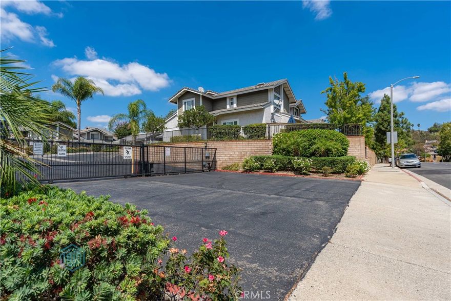 Welcome to 1133 Golden Springs Dr Unit D, a beautiful two-story condo located in the highly desirable gated community of Diamond Bar. This inviting home features 2 spacious bedrooms and 2.5 bathrooms, offering both comfort and functionality. Step inside to find a bright living area with wood flooring, seamlessly flowing into a well-designed kitchen complete with ample cabinetry and a refrigerator. Upstairs, you’ll find generously sized bedrooms and nicely updated bathrooms, perfect for relaxation and privacy. Additional highlights include a 2-car garage for convenience and storage. The gated community offers fantastic amenities, including a sparkling pool and spa, providing the ideal retreat for leisure and entertainment. Situated in a prime location near 57 and 60 free ways, Sprouts Farmers Market, Oak Tree Lanes, Cal Poly Pomona and Mt San Antonio College, this condo is perfect for those seeking both comfort and convenience.
