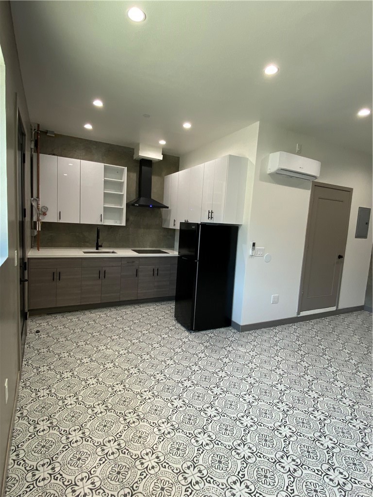 Open-concept Studio, Kitchenette it is sleek and fully functional euro style. All new Energy-efficient, appliances, washer and dryer in the unit. exceptional space for work or live.