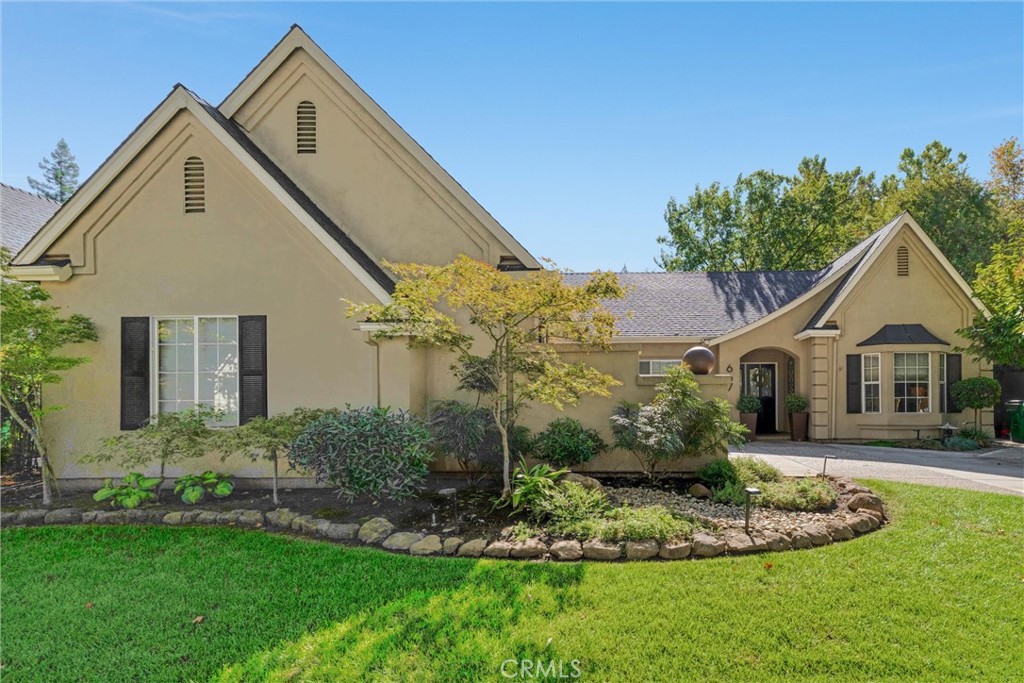 Tucked away on a picturesque tree-lined street in Chico, this delightful three-bedroom, two-bathroom home combines storybook charm with modern updates. Inside, you’ll find soaring ceilings in the living room that create a bright, open feel, complemented by a cozy fireplace. The kitchen is truly impressive with beautiful quartz countertops, a designer backsplash, crisp white cabinetry, and plenty of space for cooking and entertaining.
Both bathrooms have been thoughtfully remodeled, and the spacious primary suite features a gorgeous en-suite with a walk-in shower. Fresh paint, newer flooring, newer fencing, and countless designer touches bring a stunning, move-in-ready appeal to every corner of this home. Energy efficiency is also a plus, with solar and a whole house fan.
Step outside to your private backyard retreat, complete with beautiful landscaping and a charming pergola—perfect for entertaining or enjoying quiet evenings at home. The attached two-car garage provides ample storage, rounding out this wonderful property.
Located in one of Chico’s most sought-after neighborhoods, this home offers the perfect blend of charm, style, and comfort.