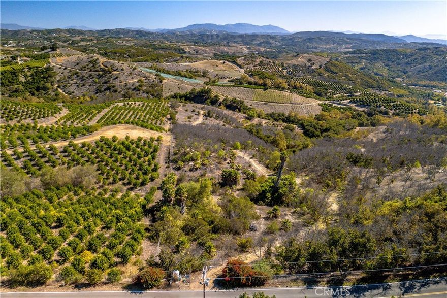 Ready to build or bring in your prefab dream? This 9.90-acre panoramic view lot offers wide-open potential with no HOA and no building restrictions on prefabs. The old avocado grove is ready to be cleared, making way for your vision—whether that’s a custom home, weekend getaway, or income property. A 1.5” water meter is already in place, and power is available in the street. Priced for a quick sale, this is your chance to scoop up a piece of land with room to breathe and freedom to create.