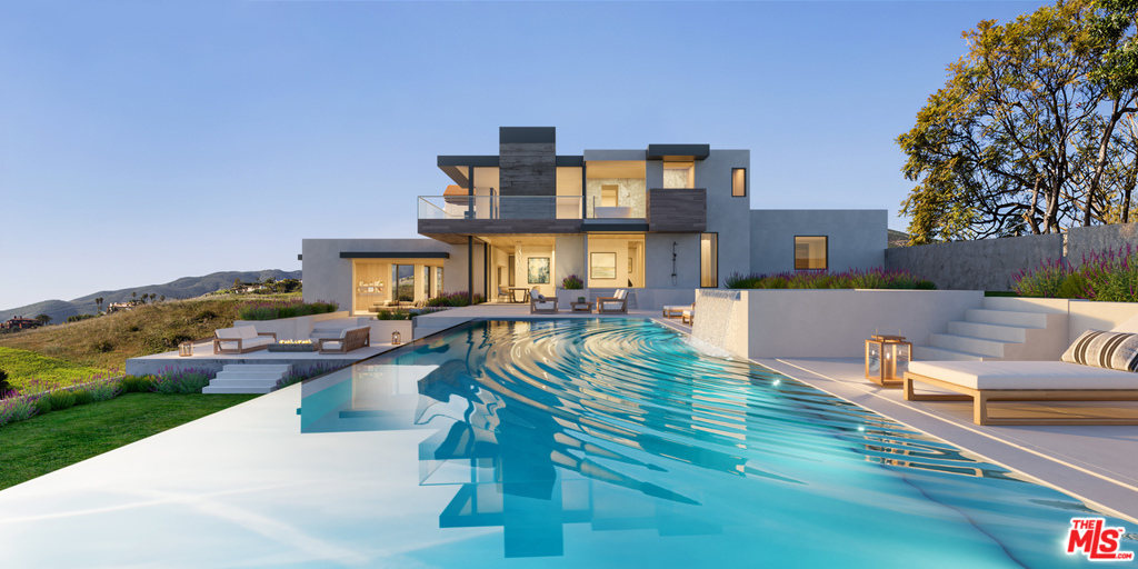 Renowned architect Doug Burdge AIA has designed new conceptual plans, modernizing the current Mediterranean-style into a stunning masterpiece. Providing gorgeous panoramic ocean, mountain, & coastline & whitewater views. Behind gates on apx. 2 beautiful terraced landscaped acres, nearly every room takes in sweeping views. The house combines great flow, spacious rooms, huge windows, & high ceilings, w/classic details such as interior archways, & a curved staircase w/scrolled railings that winds to a columned mezzanine on the bdrm level. The gourmet kitchen has a center island, breakfast area w/views, & a breakfast counter that overlooks a large family room w/FP. A large, bright living room also has a FP. The master suite is complete w/sitting room, meditation room, FP, balcony, large closet, divine bath, & sweeping views. The beautiful grounds feature large view patios for lounging/dining, sunken pool, hot tub, & pathways that meander among the plantings. 4-car garage & motor courtyard.