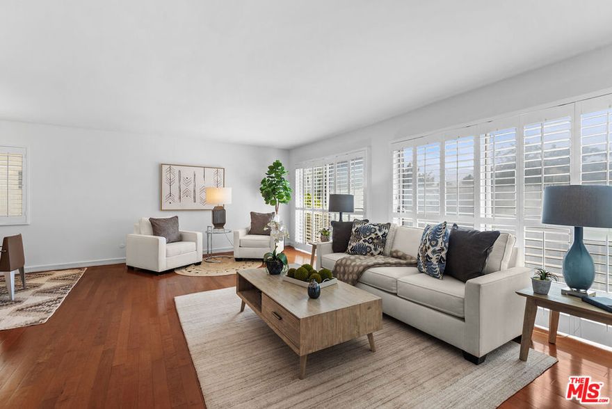 Welcome to this bright front facing condo perfectly situated in one of the most desirable and convenient neighborhoods on the Westside.  Elevated above street level, this spacious unit offers a great floorplan and abundant natural light, ideal for both relaxing and entertaining.  Enjoy a generous living and dining area, large windows/doors and a kitchen with updated appliances and a charming breakfast area.  The primary suite features an en-suite bath and 2 walk in closets, while the 2nd bedroom is perfect for guests, a home office or a flex space.  Both baths are updated, and new HVAC installed in 2023.  Located close to everything - Wesfield Century City Shopping, Century City Offices, Fox Studios, Westwood Village and UCLA, Beverly Hills - you will love the convenience of being near top shopping, dining, entertainment, parks, etc.  Additional highlights include inside laundry, secure parking with EV chargers, pool and spa, and community rooftop terrace.  Don't miss this opportunity to live in comfort and style in one of LA's most sought after areas!