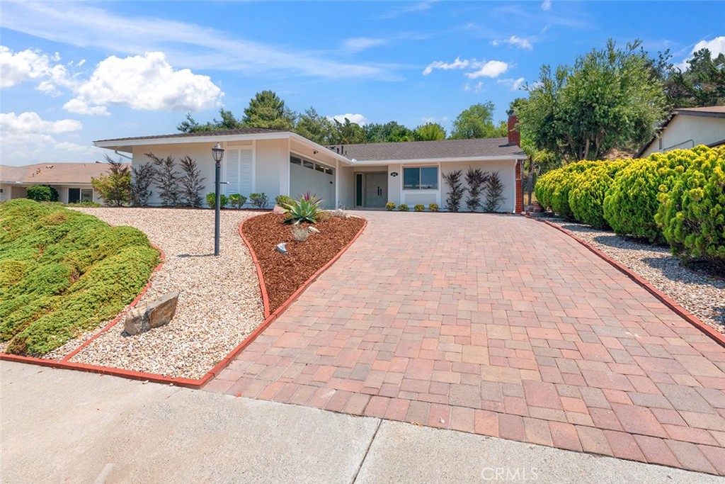 Welcome to this exceptionally upgraded mid-century home in the sought-after 55+ Seven Oaks community of Rancho Bernardo. A single-story gem originally built in 1970 and offering approximately 1,614sf of open living space, with another 324sf California room addition, this home provides the perfect blend of updated features and architectural charm. With a wonderful and spacious open-concept, this cool house has been completely modernized with new laminate wood flooring, completely rehabbed kitchen and bathrooms including new cabinets and countertops, new stainless steel appliances and has fresh paint inside and out. The premium upgrade also includes new interior recessed lighting, lots of plumbing and electrical improvements and so much more. Enjoy seamless, cozy yet airy indoor-outdoor living that blends the spacious interior with the private landscaped backyard, while community features like the pool, spa, pickleball courts, and clubhouse all enhance the premier lifestyle offered at Seven Oaks. All this comes with a low annual HOA of just $47/month. This is a good one so don't miss out!