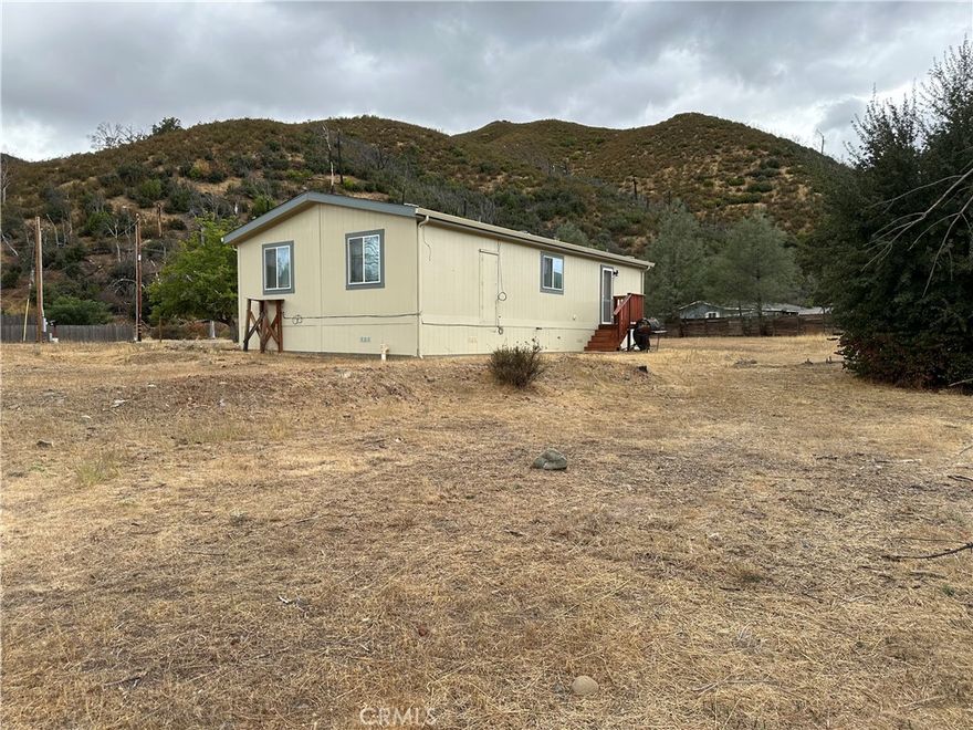 Experience peaceful, country living in the quiet and scenic Spring Valley area. This charming 3-bedroom home offers the perfect blend of comfort and rural lifestyle, ideal for those seeking space for livestock, gardening, or simply enjoying nature. Nestled at the edge of Wolf Creek, the property features a cozy, open-concept kitchen and living room layout, complete with a propane stove, dishwasher, refrigerator, and washer & dryer—all included.  with the primary bedroom offering a spacious walk-in closet. Enjoy additional space and privacy with the included adjacent lot at 3850 Spring Valley Rd, offering even more potential for expansion or outdoor activities.