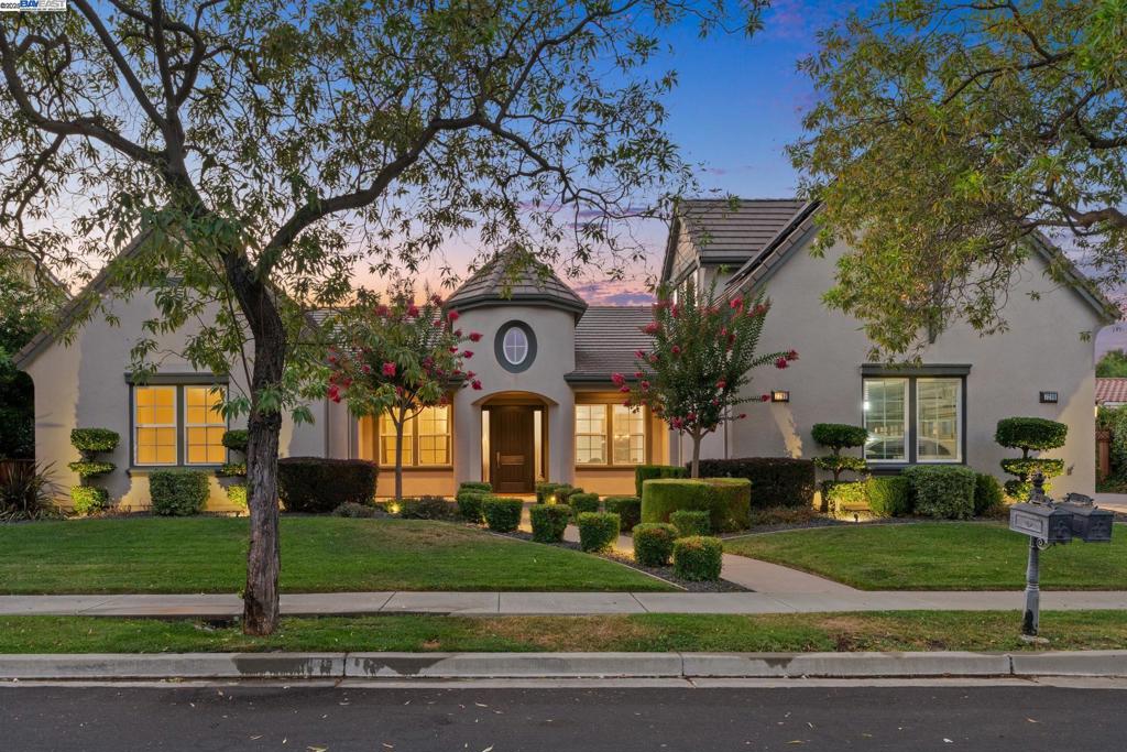 THIS IS IT! Rarely Available one story with ADU. Pristine 6 BR, 5 BTH luxury home in premium cul-de-sac location including a 1 BR/1 BTH ADU above the garage. The modern floor plan features luxurious hardwood-style LVP flooring, designer carpeting, and vaulted ceilings. Elegant formal living room with 2 sided fireplace, large formal dining room with custom chandelier. Remodeled gourmet kitchen with quartz counters, stainless steel appliances, built-in refrigerator, and an oversized center island flows seamlessly into the spacious sunny family room with gas fireplace. The primary suite features a spa-like marble bath and a huge walk-in closet. There is a stately office/bedroom off the entry as well as a full bath. It features a large secondary bedroom suite plus 2 spacious bedrooms with a Jack & Jill bath. There is also a 1 BR/1 BTH ADU over the garage with a separate outside entrance... perfect for multi-gen living or short-term rentals.The generous .31 Acre lot features an expansive rear yard with sparkling pool & spa with water feature, gazebo, and a custom covered patio. The quiet cul-de-sac location is walking distance to the Marlyn Kane trail, dog park, and award-winning schools. Easy commute access to I580 & I680 and the ACE Train. No HOA. Owned solar. Welcome home!