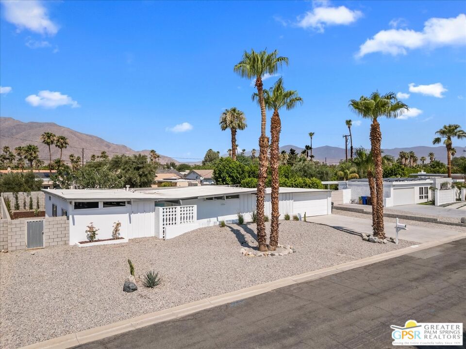 Here it is! A rare opportunity to own an architecturally significant mid-century modern masterpiece designed by renowned architect Hugh Kaptur. Originally built in 1960 and remodeled in 2017, this stunning 3-bedroom, 2-bath home captures the essence of desert modernism while delivering the comfort and style of today's living standards. Set on a spacious lot in Ranch Club Estates, this home features clean lines, an open-concept layout, cement flooring throughout, and an iconic "Butterfly" roofline that defines its architectural pedigree. Inside, natural light streams through clerestory windows and expansive sliders, blurring the line between indoor and outdoor living. The show-stopping kitchen features quartz counters, modern two-tone cabinetry, and Stainless steel appliances, while the updated bathrooms feature clean tile walls, floating vanities, and spa-like finishes. Outside, a private sanctuary awaits complete with covered patios, expansive mountain views, a sparkling boomerang pool. Recent upgrades to the home include new HVAC in 2021, new foam roof in 2024, and fresh exterior paint. Whether you're looking for a full-time home or a stylish weekend escape, this Kaptur-designed gem delivers timeless design and effortless desert living. Don't let this one get away. Schedule your showing today.
