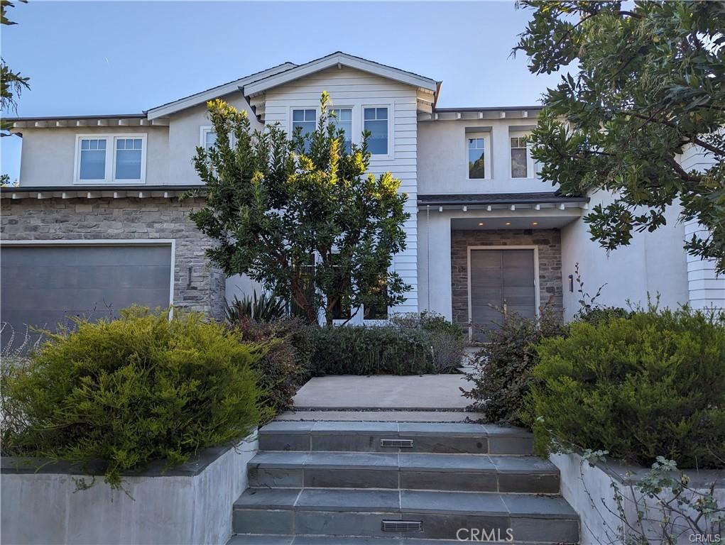 Modern designer estate, fully furnished, nestled in a beautiful neighborhood South of the boulevard in Encino. Built on an expansive 20,000 Sqft lot and set behind stunning stainless steel gates, this home features 5 bedrooms + 6 baths and a large, brilliantly landscaped back yard full of amenities. Enter through large double doors into a bright and airy open floor plan that boasts high ceilings throughout. The stunning living room is surrounded by white walls and numerous windows that provide natural light. Rear doors open to offer the quintessential indoor/outdoor living experience. The downstairs area features a gorgeous fireplace and a separate formal dining room with table and seating for 8+ family and friends, as well as a large sitting room with vaulted ceilings. Enjoy a full gourmet kitchen; a culinary enthusiast's dream, comes equipped with professional grade Miele appliances, custom cabinets, a massive island for food prep and seating, and a cozy breakfast area. Reminiscent of a five-star resort, the spacious backyard retreat is the perfect spot to entertain guests. Surrounded by lush landscaping, it consists of a brilliantly finished pool with a large, attached spa, poolside pergola with fire pit, summer kitchen with bar seating and covered patio. Built-in BBQ, pizza-oven, covered large outdoor dining area with table and chairs, and plenty of fruit trees. All bedrooms and bathrooms have been outfitted with top-quality finishes and fixtures, personally selected by the designer. This newly built property is an ultra-modern Smart Home and has a large movie theater on the lower level with rows of theater seating. Large, attached garage for storage and secure parking. Comprehensive security system and alarm installed for your safety. This home is fully furnished, including all bedrooms, kitchen appliances and cookware, and original fine art pieces sourced and curated by the owner. Step into luxury as you walk through the front door and experience this home’s fabulous amenities. This property gathers the best of modern design, color, texture, and quality that provides the ultimate living experience. Available immediately. SHOWN BY APPOINTMENT ONLY.