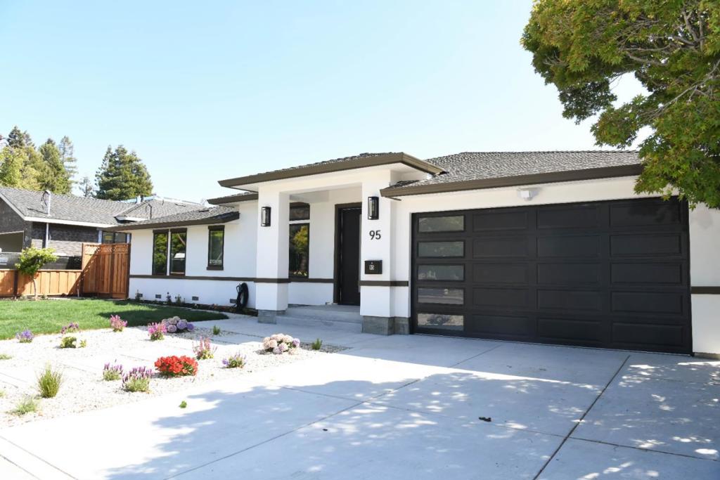 Nestled in the vibrant city of Mountain View, this stunning 2,758 sq. ft. home, featuring a 2,279 sq. ft. main house and a connected 479 sq. ft. JADU, was fully added on and renovated by August 2025, offering modern luxury and practicality with five spacious bedrooms, including 10ft ceiling in new construction, office and a master suite with a walk-in closet, the home is designed for comfort. The gourmet kitchen boasts semi-custom cabinetry, a large quartz island, Thor appliances, a built-in microwave, and a wine refrigerator, perfect for culinary enthusiasts. Enjoy a wet bar, custom glass wine cabinet, electric fireplace, and elegant hardwood and tile flooring. Energy-efficient features include double-pane Milgard windows, full insulation, a Level 2 EV charger, and Energy Star appliances. The master bathroom offers a double sink, freestanding tub, and separate shower. Smart technology includes Cat 6 wiring, pre-wired security cameras, and smart locks on Kwikset Halifax doors. Dual Carrier HVAC systems ensure year-round comfort, while a new fenced yard with sprinklers and access to the Mountain View Whisman School District add appeal. A modern garage with an 8-foot door and a 220V EV hookup complete this Mountain View gem, ready for you to call home.