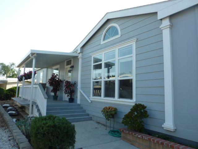 This is not your parents' mobile home! Welcome to this amazing space! Close the front door behind you, and enter into your own private escape from the craziness outside! High ceilings, tasteful design & colors & immaculate condition! Walk-in closets, ceiling fans, kitchen-to -die-for, custom entry ramp plus deluxe storage shed. Just 6 years new & hard to tell it has ever been lived in! If that wasn't enough, consider the over-sized lot that offers the possibility of adding a garage & several other options. Wait! There's more! This is one of the most desirable locations in the entire park! Cul-de-sac street nestled deep in the park far from the noise & traffic of busy streets. Original owner! This manufactured home is located in a most beautiful setting with walking paths, bubbling brooks and ponds throughout the park. Enjoy the pool, spa or putting green located next to the beautiful clubhouse. You'll love living in this quiet resort setting