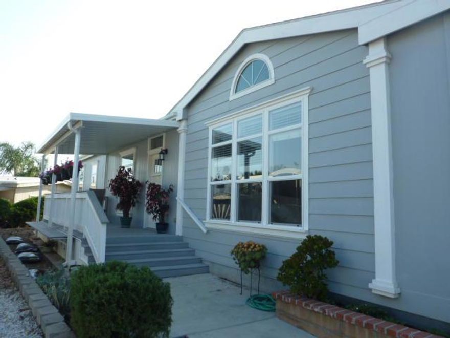 This is not your parents' mobile home! Welcome to this amazing space!  Close the front door behind you, and enter into your own private escape from the craziness outside!  High ceilings, tasteful design & colors & immaculate condition!  Walk-in closets, ceiling fans, kitchen-to -die-for, custom entry ramp plus deluxe storage shed.  Just 6 years new & hard to tell it has ever been lived in!  If that wasn't enough, consider the over-sized lot that offers the possibility of adding a garage & several other options.  Wait!  There's more!  This is one of the most desirable locations in the entire park!  Cul-de-sac street nestled deep in the park far from the noise & traffic of busy streets.  Original owner!  This manufactured home is located in a most beautiful setting with walking paths, bubbling brooks and ponds throughout the park. Enjoy the pool, spa or putting green located next to the beautiful clubhouse.  You'll love living in this quiet resort setting