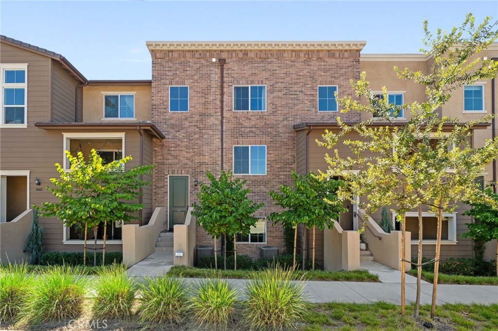 Discover a charming North Claremont condominium nestled in a tranquil community, strategically close to freeways and to the highly desired Claremont Schools. This beautiful home boasts a welcoming and intimate space for those desiring to be close to the popular Village and highly renowned Claremont Colleges. This home presents stunning natural light that fills the modern open floor plan with mountain views from the expansive kitchen and primary rooms. The home offers three spacious bedrooms with an additional room on the first floor that can be used as a fourth bedroom, den, or the perfect office space. The main bedroom offers double sinks, a pleasant walk-in closet, and an additional "his" closet. A highlight is the gorgeous kitchen, featuring quartz countertops, plenty of counter and cabinet space, as well as a large window that provides stunning mountain views. There is a cozy peninsula that hosts a casual dining option and an additional dining area that connects the family room and kitchen in a perfect open space for entertaining and fostering interaction. There is a modern tech space for either a library, gaming, or playroom. Step onto the open patio to embrace Southern California's weather, ideal for serene mornings or leisurely afternoons. Direct garage access ensures convenience with the addition of electric vehicle charging access. The community also offers a large pool with an outdoor barbecue perfect for entertaining and a beautifully manicured park within steps. In essence, this Claremont home blends comfort, convenience, affordability, and elegance, making it a perfect home with its prime location, modern features, and delightful outdoor space.