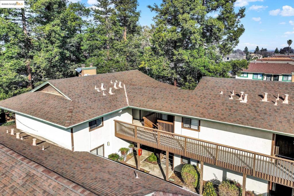 WOW! Upper Floor Unit (2nd Floor). Just Finished Carpets and Paint. Nice Size Living/Dining Room with Cozy Fireplace. Balcony off Dining Area. Includes 2 Bedrooms and 2 Bathroomss. Hall Bathroom has Laundry Closed. Primary Bedroom Has Full Bathroom with Shower Stall. Complex has a Pool. Very Convenient Location the Highway 4, Major Shopping Centers, The Delta, Downtown, Schools and More.